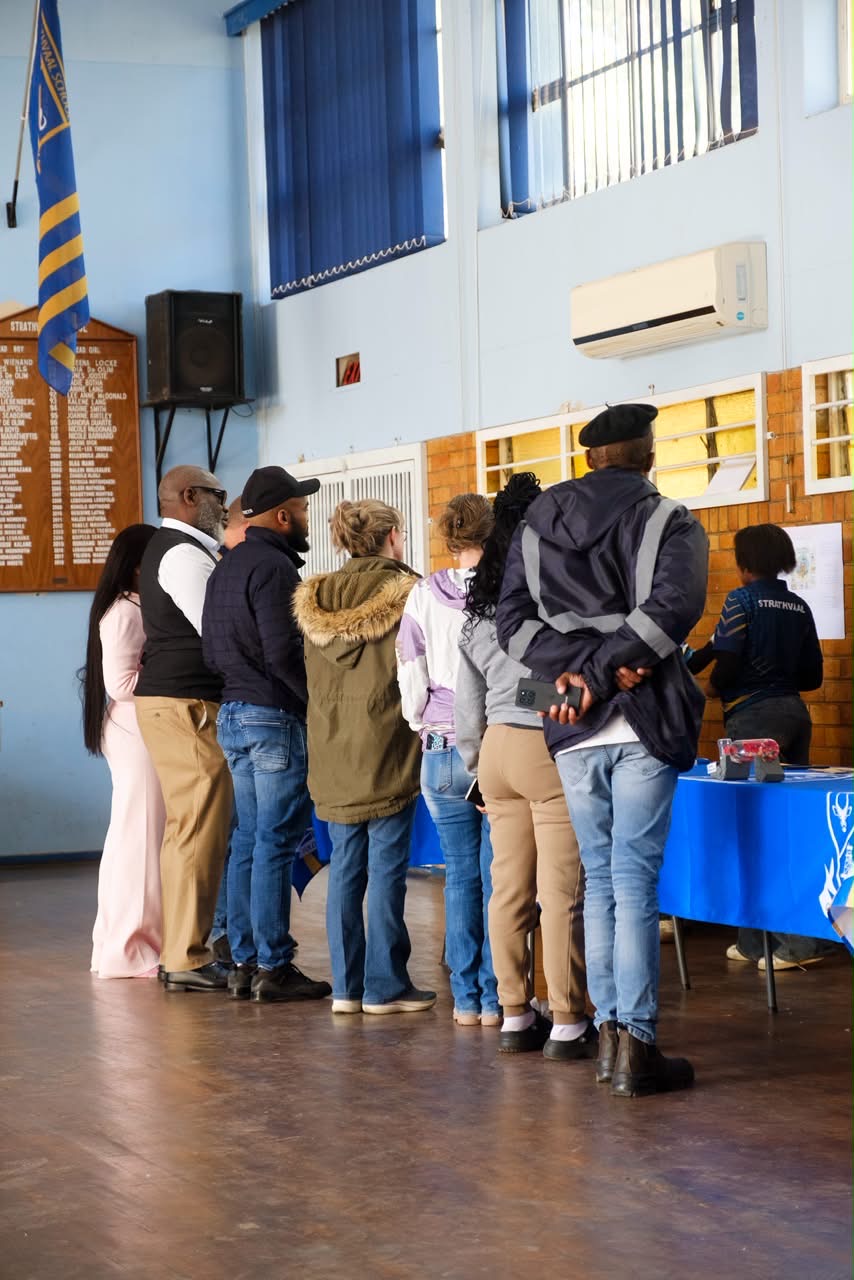 Parents and learners queueing for registration support at Strathvaal Primary School in Stilfontein